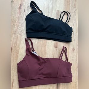 Asymmetric strap sports bras